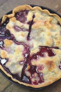 a pie sitting on top of a wooden table