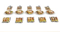 several different types of food are shown on separate plates and in individual serving trays