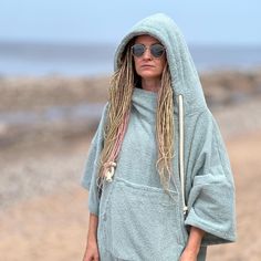 Beach Poncho Wrap yourself in luxury with our Beach Poncho, made from 100% high-quality cotton terry. This premium material is not only incredibly soft to the touch but also quick-drying, ensuring you stay comfortable whether you're fresh out of the water or just lounging by the pool. Design & Fit: - One-size-fits-all design, effortlessly adaptable for all body types, making it ideal for families or couples who love to share. With its unisex, relaxed fit, this poncho allows for easy movement and Oversized Beach Poncho, Oversized Beachwear Poncho For Beach Season, Summer Beach Poncho In Green, Green Oversized Poncho For The Beach, Oversized Green Poncho For The Beach, Beach Poncho, Running On The Beach, Poncho Wrap, Pool Design