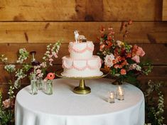 a wedding cake sitting on top of a table