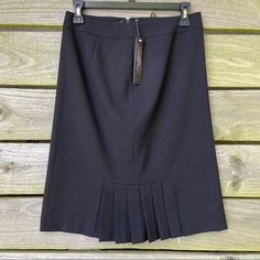 Nwt; No Holes, Pilling, Snags Or Stains. Straight/Pencil Skirt With Pleated Design In Middle On Front And Back. 63% Polyester, 33% Rayon, 4% Spandex. Liner Is Underneath, And It's Zip Closure. Measurements Are Approximate: Waist 13.5in., Hip 18in., Waist To Hem 22.5in. Please Check Measurements For Fit. Clothing Is Always Photographed In A Natural Sunlight Setting And Color May Differ Depending On Your Screen Resolution. If You Have Questions, Please Ask Before Purchasing. *Items Ship From A Smo Fitted Pleated Office Skirt, Fitted Lined Pleated Skirt For Office, Classic Fitted Pleated Pencil Skirt, Fitted Black Pleated Skirt For Office, Black Fitted Pleated Skirt For Office, Fitted Pleated Pencil Skirt For Work, Fitted Pleated Pencil Skirt, Black Pleated Pencil Skirt For Work, Black Pencil Pleated Skirt For Work