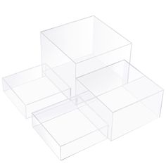 three clear boxes are stacked on top of each other