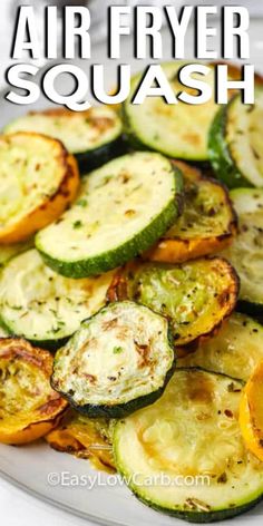 grilled zucchini and orange slices on a white plate with text overlay