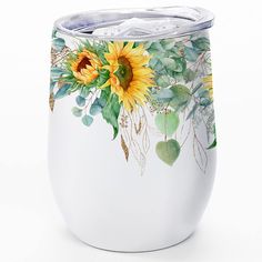 a white vase with sunflowers and greenery painted on it