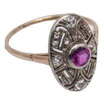 A former Art Deco ring from the 1920s.  Made of 0.585 yellow gold and 0.990 silver.  Central natural pink ruby weighing 0.40ct surrounded by diamonds with a total weight of 0.25ct (SI-VS)  Preserved hallmark for Hungary in the 1920s.  Item weight: 2.17g  Size: 15 - correction possible Antique Ruby Ring With Single Cut Diamonds, Antique Ruby Rings With Single Cut Diamonds, Antique Style Brilliant Cut Yellow Gold Ruby Ring, Antique Yellow Gold Ruby Ring With Brilliant Cut, Victorian Ruby Ring With Diamond, Vintage Ruby Rings With Single Cut Diamonds, Antique Pink Rose Cut Diamond Rings, Victorian Yellow Gold Ruby Ring With Single Cut Diamonds, Vintage Yellow Gold Ruby Ring With Single Cut Diamonds