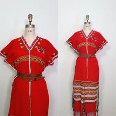 |d e s c r i p t i o n| *circa early 2000s *amazing traditional Thai hilltribe dress  *gorgeous weaving and bright red cotton *embroidery along neck and sleeves  *tassels around dress that create wonderful movement!  *tribe crest at left heart  *a loose fit, looks great belted as well!  |i n f o| tag: none  condition: very good vintage condition.  |m e a s u r e m e n t s| bust: 46" waist: 48" hips: 48" length: 52" est. size: l/xl mannequin measurements: bust 35"/waist 25.5"/hips 35" Red Bohemian Dress With Tassels, Traditional Tunic Dress With Tassels, Dress With Tassels, P T, Dress Clothes For Women, Gorgeous Dresses, Looks Great, Art Collection, Loose Fitting