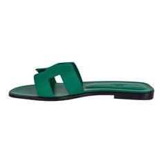 Guaranteed authentic Hermes Oran Emerald sandals.This stunning limited edition Hermes Oran flat slide sandal is featured in Epsom leather.The iconic H cutout over the top of the foot.Emerald embossed calfskin insole. Wood heel with leather sole. Comes with sleepers, signature Hermes box and ribbon. NEW or NEVER WORN.Please see our extensive collection of Hermes Oran sandals available.final saleSIZE 37 USA SIZE 7 SHOE MEASURES:HEEL .5"UPPER SOLE 7.5"CONDITION: NEW or NEVER WORN Hermes Slippers, Hermes Oran Sandals, Hermes Shoes, Hermes Oran, Hermes Box, Wood Heel, Leather Flat Shoes, Birthday Shopping, Over The Top