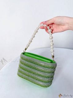 Bird in Bag - Stylish Striped Handheld Cage Bag with Bold Color Accents and Dazzling Diamond Embellishments Glamorous Green Clutch Bag, Glamorous Green Event Bag, Green Embellished Bag For Events, Glamorous Green Evening Bag, Green Rhinestone Party Bag, Elegant Green Clutch For Shopping, Cage Bag, Rhinestone Bag, Purple Details