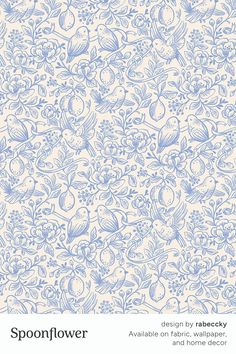 a blue and white wallpaper with flowers on it