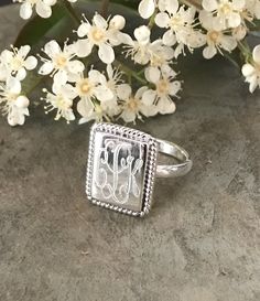 ♦️IMPORTANT INSTRUCTIONS♦️ Beautiful Pure 925 Sterling Silver (not plated) monogrammed rings. 🚩Initials should be given in the order below:🚩 🚩Please type them in the notes to seller area.🚩 FIRST NAME. LAST NAME. MIDDLE OR MAIDEN Thanks and let us know if you have any questions. Thank you for visiting our shop! Monogram Rings Silver, Classic Engraved Rectangular Initial Ring, Classic Rectangular Rings With Initials, Classic Rectangular Signet Ring With Initials, Classic Rectangular Signet Ring Stamped 925, Silver Engraved Monogram Ring, Anniversary Initial Ring With Rectangular Shape, White Rectangular Classic Signet Ring, Silver Monogram Initial Ring In Sterling Silver