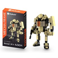 a lego robot next to a box with it's packaging on the side and in front