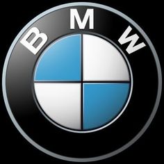 the bmw logo is shown in this black and white photo, with blue letters on it