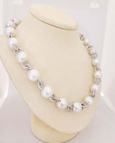 For Sale on 1stDibs - A very classic and wearable pearl and diamond necklace. The necklace is designed with 22 South Sea Pearls 12.5mm x 11.6 mm. The pearls are connected by Pearl And Diamond Necklace, South Seas, South Sea Pearls, Sea Pearls, Diamond Necklace, Pearl Necklace, For Sale