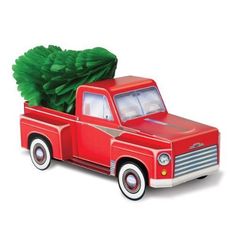 a red truck with a christmas tree in the back