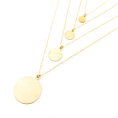 Expertly crafted by our team, the Elena Disc Necklaces in gold or silver feature 14k gold-filled or sterling silver chain and blank disk charms. Customize with hand stamping, adding initials, words, or dates for a personal touch. Contact us for stamping options and prices. Elevate any outfit with this timeless and unique piece. 7mm disc: 16" chain 9.5mm disc: 18" chain 13mm disc: 18" chain 22mm disc: 18" chain Flat Heel Boots, Cut Clothes, Beanie Style, Gold Charm Necklace, Sneaker Slippers, Heel Slippers, Charm Necklaces, Disc Necklace, Necklace Sizes