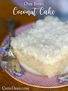 a piece of coconut cake on a plate