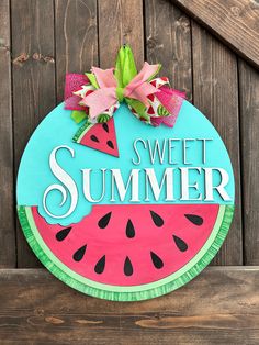 a sign that says, sweet summer with a slice of watermelon on it