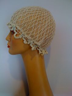 "Off white in color, crocheted in a fine cotton/ silk blend very delicately done, this victorian sleeping bonnet can also be head wear for a wedding. It is fully lined with off white netting, and in excellent antique condition. Measures about 28 \" in circumfrence. There is a fine crocheted tasseled drawstring, that can adjust the size of this bonnet. if using this bonnet as a wedding cap there are endless possibilities in which this cap can be embellished (ie. pearls, sequins tiny flowers etc. Cream Bonnet Cap One Size, Cream Colored One Size Bonnet Cap, Cream One-size Bonnet Cap, Vintage White Hat One Size, White Crochet Bonnet, One Size Fits Most, White Crochet Bonnet One Size, White Crochet Bonnet One Size Fits Most, White Crochet Bonnet, Wedding Cap