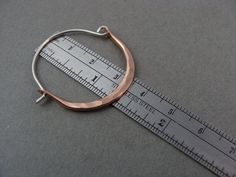 "These delicate 14k rose gold filled hoops have been hand formed and connect to a hammered sterling silver ear wires. The metal has been hammered to be wider at the bottom and given a gentle curve. Unique, simple and perfect for everyday. Size ~ Approximately 1 1/8\" X 1 1/2\" ☞ Each pair is made by hand, expect slight variation. Be sure to check out my shop to find more size and color options. https://www.etsy.com/shop/sirenjewels ★ Shipping ~ Domestic orders are sent USPS first class and a tra Hammered Rose Gold Sterling Silver Hoop Earrings, Rose Gold Hammered Sterling Silver Hoop Earrings, Gemstone Hoop Earrings, Gold Filled Hoops, Hammered Sterling Silver, Hammered Gold, Gold Art, Moonstone Pendant, Gold Hoops