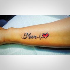 a woman's arm with a heart and the word maa - i on it