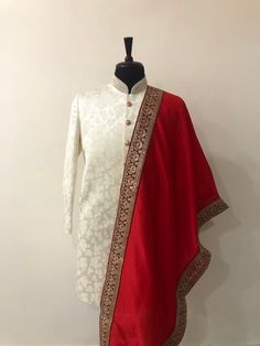 Sizes 30,32,34,36,38,40,42,44,46,48,50,52,54 BORDER DESIGN FOR THE SHAWL MAY VARY ACCORDING TO AVAILABILITY Raw Silk Straight Kurta Sherwani For Traditional Ceremonies, Raw Silk Sherwani For Traditional Ceremonies, Semi-stitched Kurta With Zari Work Traditional Drape, Traditional Drape Raw Silk Sherwani For Ceremonies, Traditional Drape Raw Silk Sherwani With Zari Work, Raw Silk Sherwani With Traditional Drape For Ceremonies, Traditional Raw Silk Sherwani With Zari Work, Embroidered Jamawar Sherwani With Traditional Drape, Eid Sherwani With Resham Embroidery For Traditional Ceremonies