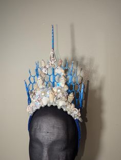 This is a beautiful one of a kind, handcrafted mermaid shell crown using a mixture of gems, shell pieces and seashells. It would be perfect for a photoshoot, a wedding or a mermaid outfit. It is absolutely beautiful and would be lovely for a photoshoot, beach wedding, or mermaid costume. The crown will fit the average female size head. I am also happy to make custom order pieces! Please contact me with any questions regarding my current pieces or a custom design. Diy Mermaid Crown, Mermaid Headdress, Mermaid Headpiece, Shell Crown, Costume Mermaid, Crowns And Tiaras, Shell Crowns, Seashell Crown, Photoshoot Beach