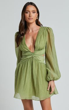 Get ready to turn heads in our Casey Mini Dress in Sage. This stunning green dress features a plunging neckline and puff long sleeves, adding a touch of drama and sophistication to your party day look. The A-line silhouette flatters every body shape, while the lightweight rayon fabric ensures you stay comfortable all day and night. Whether you're hitting the dance floor or making a statement at a special event, this mini dress is sure to make you feel confident and empowered. Shop now and embrac Puff Long Sleeve Dress, Dresses For The Races, Basic Black Dress, Bachelorette Dress, Spring Maxi Dress, Neon Outfits, Fashion Queen, Puff Long Sleeves, Long Sleeve Knit Dress