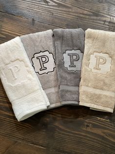 four towels with the letter p on them