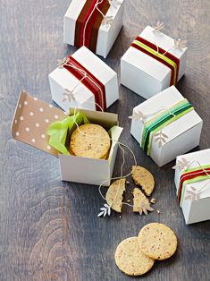 several boxes with different types of cookies in them