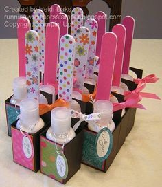 an assortment of toothbrushes in boxes on a table