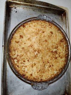 a pie sitting on top of a metal pan