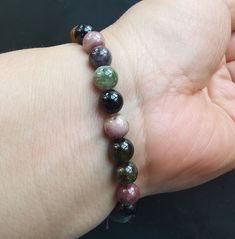 "wholesale Tourmaline quartz stone bracelet 1.Material: natural Tourmaline quartz beads, gemstone beads,Elastic line 2. Size of bead: approx.7mm-7.5mm, in size, approx 7.5\" 3.This price is one bracelet. 4. If you have speical requests, I'll be happy to do it for you. 5.WYSIWYG, natural light shooting, because of the light or your monitor and other reasons, there may be a little chromatic aberration, which can not be controlled artificially, Please accept. if you have doubts, please contact me, Tourmaline Bracelets With Round Beads As A Gift, Spiritual Tourmaline Beaded Bracelets With Round Beads, Spiritual Tourmaline Beaded Bracelet With Round Beads, Healing Tourmaline Gemstone Beads Bracelet, Spiritual Tourmaline Bracelets For Healing, Man Bracelet, Tourmaline Quartz, Tourmaline Beads, Turquoise Howlite