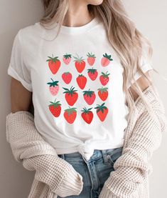 "Strawberry Shirt, Strawberry Clothes ,Strawberry Tee, Garden Shirt ,Aesthetic Clothing, Cottagecore Clothes,Botanical Shirt,Strawberry Print Please Check All Photos For Details.   🐞Choose Your T-Shirt Size From The Drop-Down Lists Next To The item Picture   ⭐Choose Of Your T-Shirt Color From The 2nd Picture   🐞Use \"Add message to Seller\" link On The Checkout Page To Send me the Following important Details For Your Order's Customization.   ⭐Shipping Time Varies by location (we are located in Sugar Land, Texas) please consider that our turn around time is 1 to 3 business days.     ⭐Which brand do you use for t-shirts? We use Gildan Softstyle, Bella Canvas Unisex, Hanes, Outlash, Tees,  District and Next Level when we have a shortage of stocks for certain colors and sizes. Our printing m Strawberry Clothes, Clothing Cottagecore, Cottagecore Outfit, Garden Shirt, Strawberry Shirt, Cottagecore Clothes, Botanical Shirt, Shirt Aesthetic, Gardening Shirts