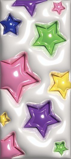 several different colored stars on a white background