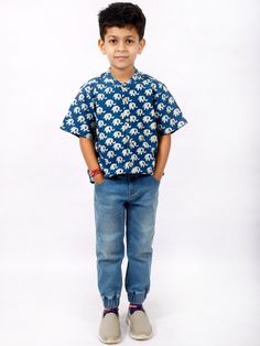 Crafted with love and intent, our Organic Muslin Shirt for boys is the perfect addition to your boy's fashion and fall clothing. Designed with a smart mandarin collar, this half sleeve shirt flaunts a majestic elephant animal print, each shirt handblock printed with precision to tell a unique story. The organic cotton shirt features enchanting indigo hues, captivating the eye and bringing out the essence of a true sustainable style. Our product isn't just a boy's shirt but a birthday gift they'l Printed Cotton Half Sleeve T-shirt, Casual Blue Half Sleeve Shirt, Cotton Half Sleeve Shirt With Graphic Print, Cotton Half-sleeve T-shirt For Summer, Summer Cotton Half-sleeve T-shirt, Summer Cotton Half Sleeve T-shirt, Playful Printed Cotton Shirt, Casual Printed Half Sleeve Shirt, Casual Printed Half-sleeve Shirt