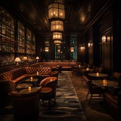 a dimly lit restaurant with leather couches and tables