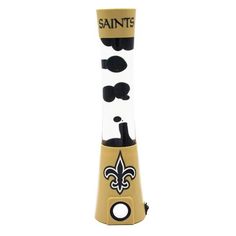 a new orleans saints bottle opener is shown in gold and black with the team's logo on it