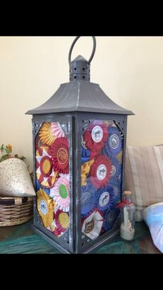 a decorative lantern sitting on top of a table