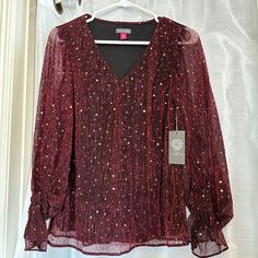 Vince Camuto Women’s Metallic Balloon-Sleeve Blouse (Brand New, Dark Wine, Xs) Polish Your Denim Look Or Update Your Night-Out Ensemble With This Stunning Top With Stylish Shimmer. * V-Neck * Long, Sheer Balloon Sleeves With Ruffled Cuffs * Lined * Metallic/Polyester; Lining: Polyester Condition: Brand New (Still Has Its Tags) Elegant Red Top With Blouson Sleeves, Red Long Sleeve Tops For Party Season, Red Long Sleeve Party Top, Red Long Sleeve Blouse With Blouson Sleeves, Red Blouse With Blouson Long Sleeves, Formal Long Sleeve Tops For Party Season, Holiday Long Sleeve Fitted Blouse, Red Winter Blouse For Party, Red Winter Party Blouse