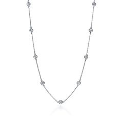 PRICES MAY VARY. 🎁 Sparkle Like Never Before: Create a modern look with this dainty silver necklace by NYC STERLING. The round cut 6mm cubic zirconia stones are bezel set and attached on a 16"-30" long sterling silver chain with an elite center stone. 🎁 All-Day Comfort & Effortless Elegance: This minimalist Sterling Silver necklace is perfect for wearing alone or together with other layered necklaces for women. It is compatible with any style and makes an essential addition to any girl's jewel Silver Necklaces Simple Layered, Diamonds By The Yard Necklace, Diamonds By The Yard, Pandora Necklace, Pearl Engagement Ring, Nickel Free Jewelry, Tiffany Jewelry, Elsa Peretti, White Gold Necklaces