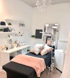 an instagram photo of a bedroom with a bed, desk and shelves on the wall