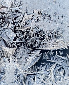 ice crystals are seen on the surface of an icy window