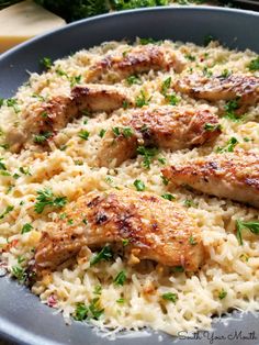 chicken and rice dish with parsley on top