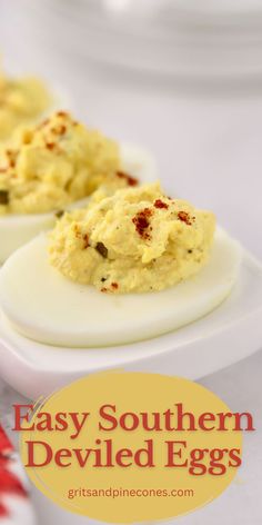 two deviled eggs on a white plate with text overlay that says easy southern deviled eggs