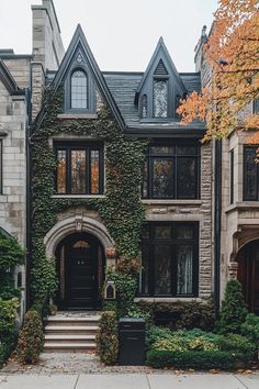 an old house with ivy growing all over it