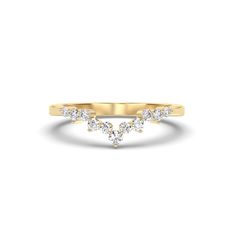 a yellow gold ring with three diamonds