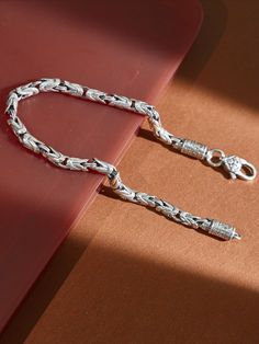 Embrace a symbol of tranquility with this pure silver bracelet, handcrafted for both women and men. Its unique peace pattern is fashioned for the trend-savvy individual, a fine jewelry gift that offers more than style; it signifies serenity. Ideal for gifting, or as your personal emblem of peace. Traditional Silver Chain Bracelets Gift, Traditional Chain Bracelet With Sterling Silver Clasp As Gift, Symbolic Bracelet With Sterling Silver Clasp For Gift, Spiritual Chain Bracelet With Sterling Silver Clasp, Silver Bangle For Meditation, Everyday Silver Spiritual Bracelets, Traditional Bracelets With Sterling Silver Clasp For Gift, Traditional Bracelets With Sterling Silver Clasp As A Gift, Traditional Sterling Silver Clasp Bracelet For Gift