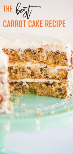 the best carrot cake recipe with white frosting and chopped carrots on top, sitting on a green plate