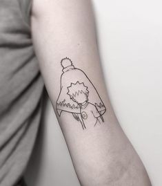 a person with a tattoo on their arm