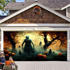 a garage with a painting on the side of it that has pumpkins in front of it